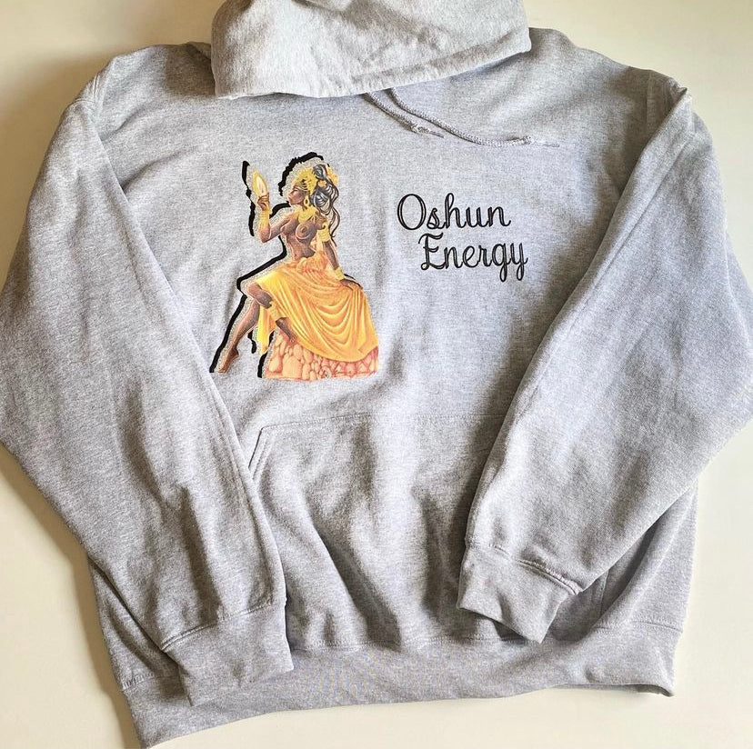 Gray hoodie with an image of the goddess Oshun with the words Oshun Energy to the right of the image
